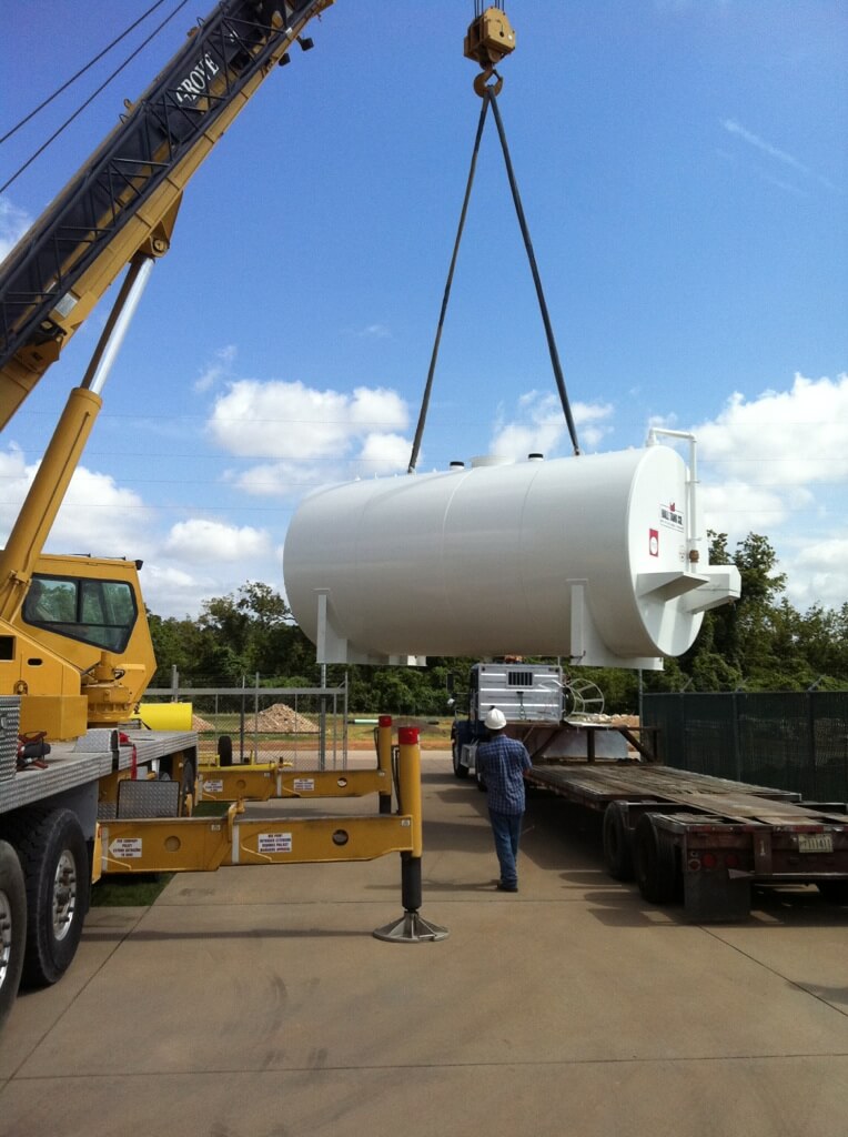 Crane lowering a tank at a Texas facility serviced by CTI Response